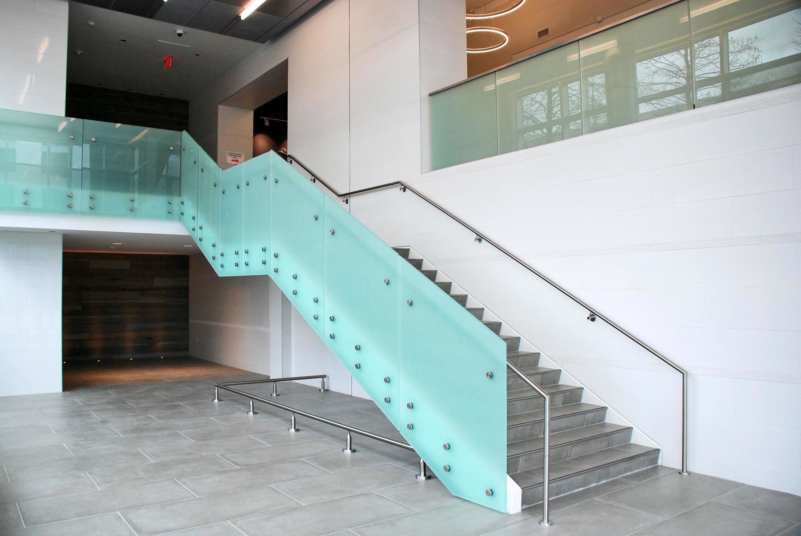 300 South Brevard Frosted Point Supported Glass Railings