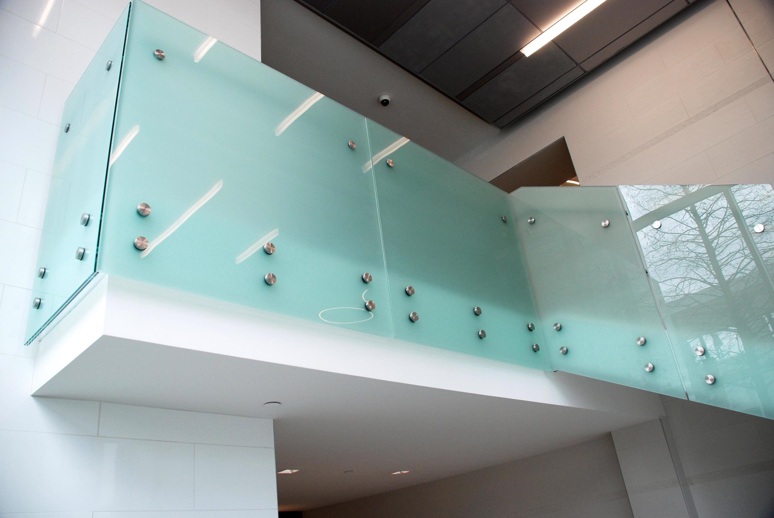 300 South Brevard Frosted Point Supported Glass Railings