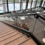 Sightline_Mizzou_Glass Railing on Stair with Track Rail and Top Cap